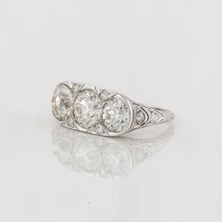 Edwardian GIA 1.65 Carat Round Cut Diamond Three Stone Engagement Ring